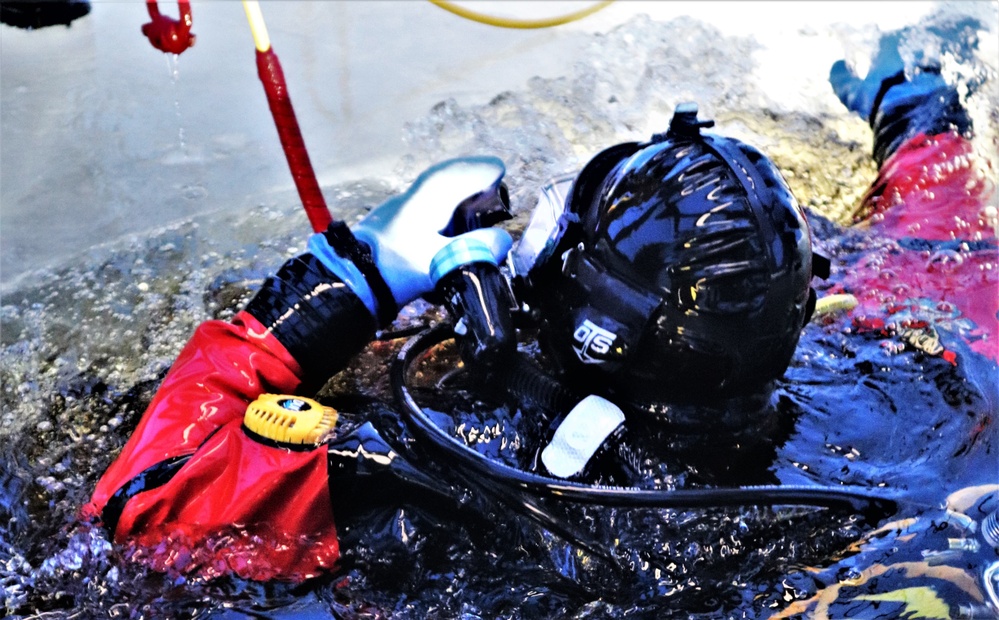Fort McCoy firefighters practice diving under ice for rescue operations