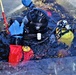 Fort McCoy firefighters practice diving under ice for rescue operations