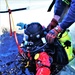 Fort McCoy firefighters practice diving under ice for rescue operations