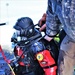 Fort McCoy firefighters practice diving under ice for rescue operations