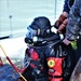 Fort McCoy firefighters practice diving under ice for rescue operations