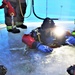 Fort McCoy firefighters practice diving under ice for rescue operations