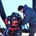 Fort McCoy firefighters practice diving under ice for rescue operations