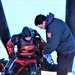Fort McCoy firefighters practice diving under ice for rescue operations