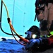 Fort McCoy firefighters practice diving under ice for rescue operations