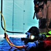 Fort McCoy firefighters practice diving under ice for rescue operations