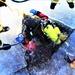 Fort McCoy firefighters practice diving under ice for rescue operations