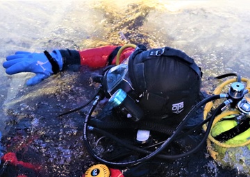 Fort McCoy firefighters practice diving under ice for rescue operations
