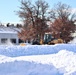 Contractors clear snow at Fort McCoy after February snowfall