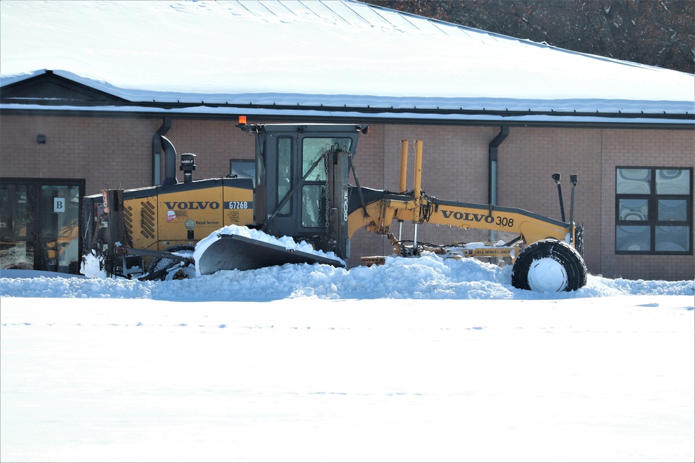 Contractors clear snow at Fort McCoy after February snowfall