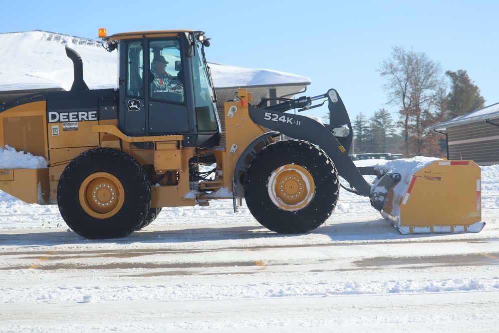 Contractors clear snow at Fort McCoy after February snowfall
