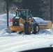 Contractors clear snow at Fort McCoy after February snowfall