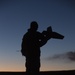 Marines display the RQ-20B Puma to Japanese Ground Self Defense Force soldiers