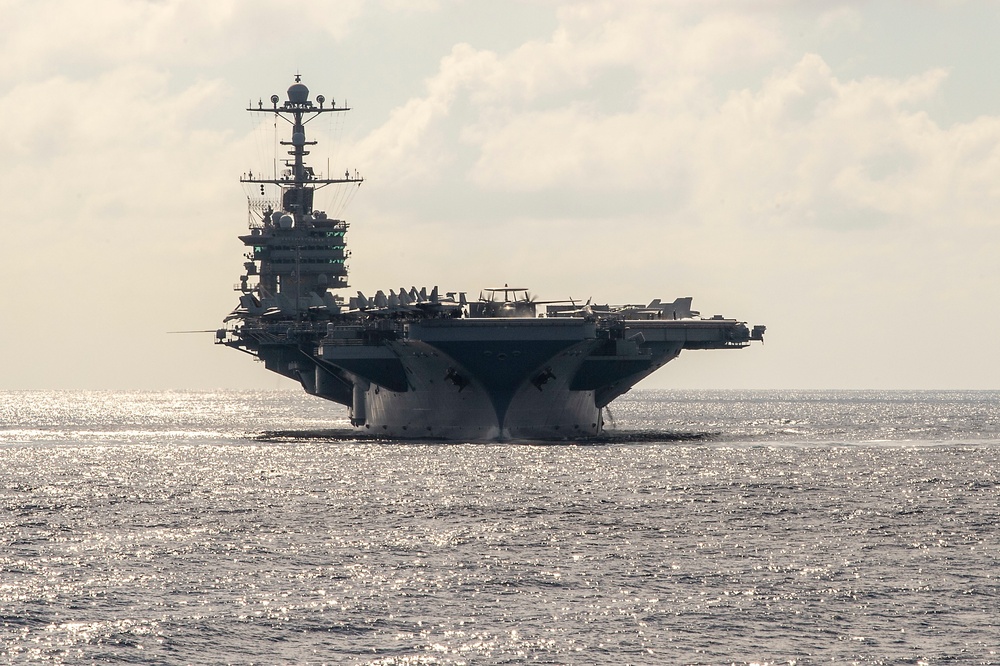 The aircraft carrier USS John C. Stennis (CVN 74) prepares to launch an E-2C Hawkeye