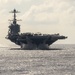 The aircraft carrier USS John C. Stennis (CVN 74) prepares to launch an E-2C Hawkeye