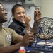 U.S. Sailors call out numbers during bingo night aboard the guided-missile destroyer USS Preble (DDG 88) in the Pacific Ocean, Feb. 16, 2019.