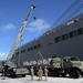 Naval Mobile Construction Battalion (NMCB) 133, Det. Guam’s crane crew conduct a turnover crane lift