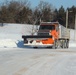 Contractors clear snow at Fort McCoy after February snowfall