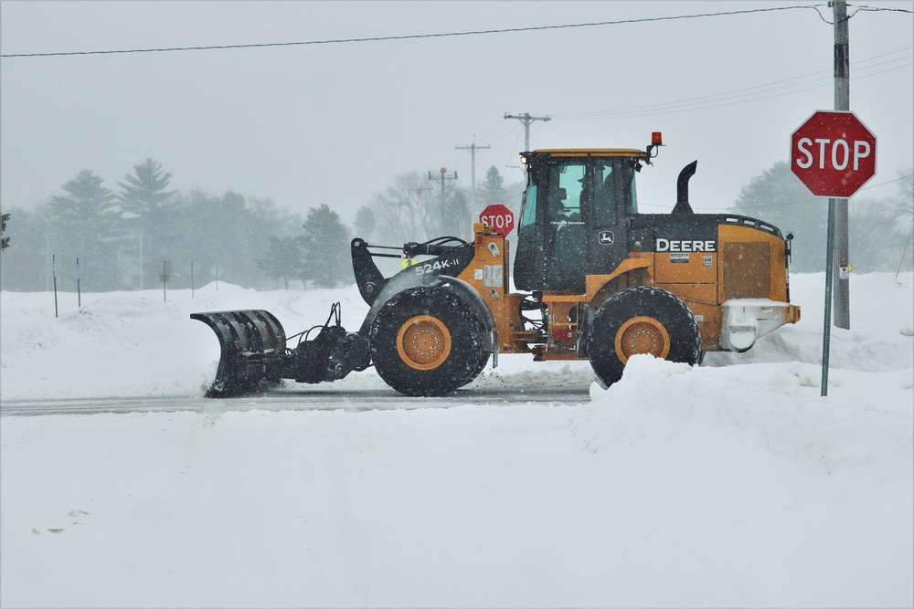 Contractors clear snow at Fort McCoy after February snowfall