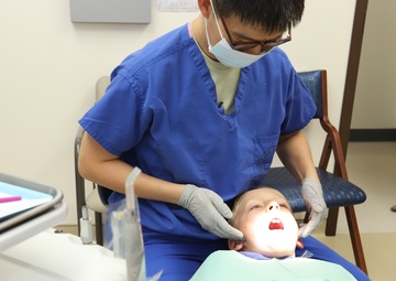 Keeping kids’ teeth healthy during a pandemic: brush, floss, no sugar