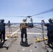 U.S. Navy Sailors conduct flight operations aboard the guided-missile destroyer USS Spruance.