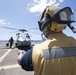 U.S. Navy Sailors conduct flight operations aboard the guided-missile destroyer USS Spruance.