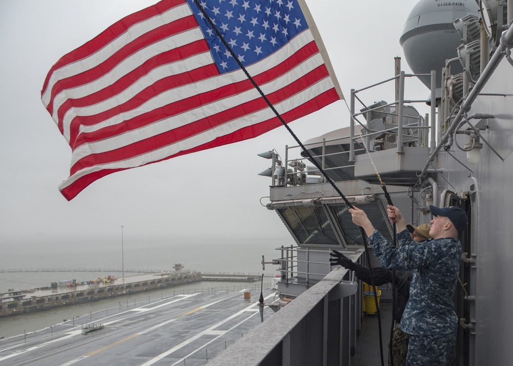 Sailors Raise Flag