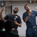 U.S. Sailors perform at a command event