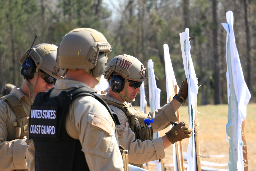 ME1 Jake Frane scores targets after a pre deployment marksmanship test