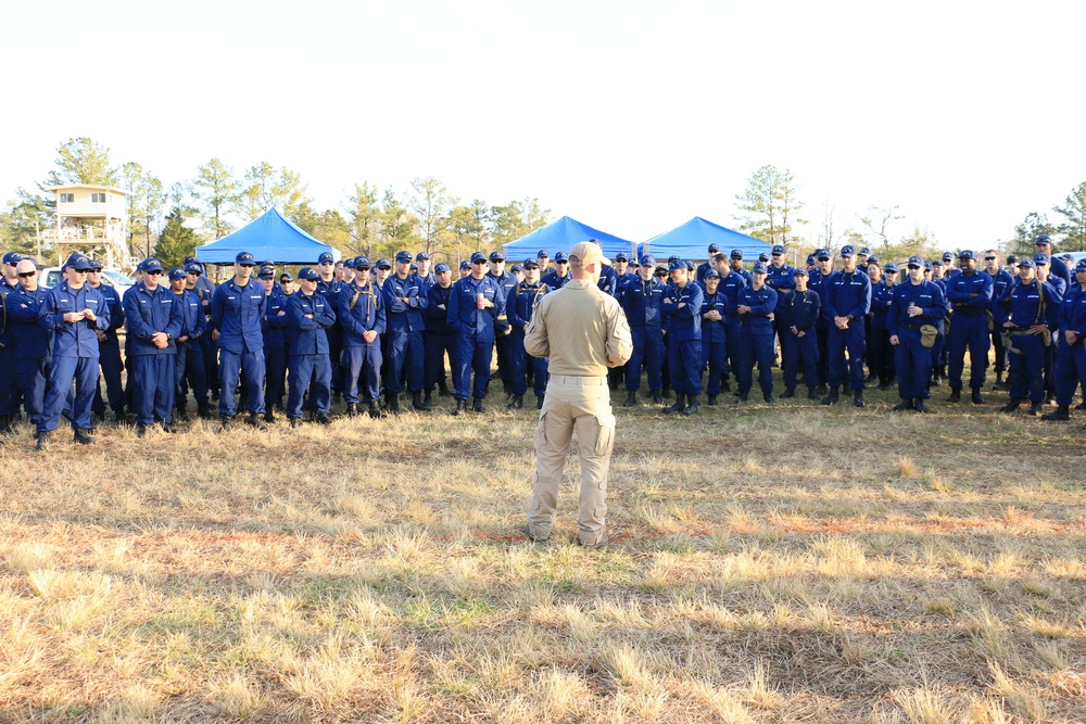 A Chief Maritime Enforcement Specialist briefs Special Missions Training Center class 19-01
