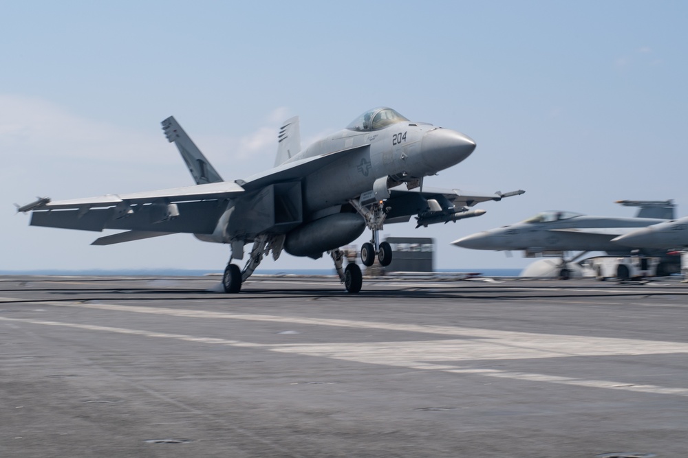 An F/A-18E Super Hornet lands on the flight deck