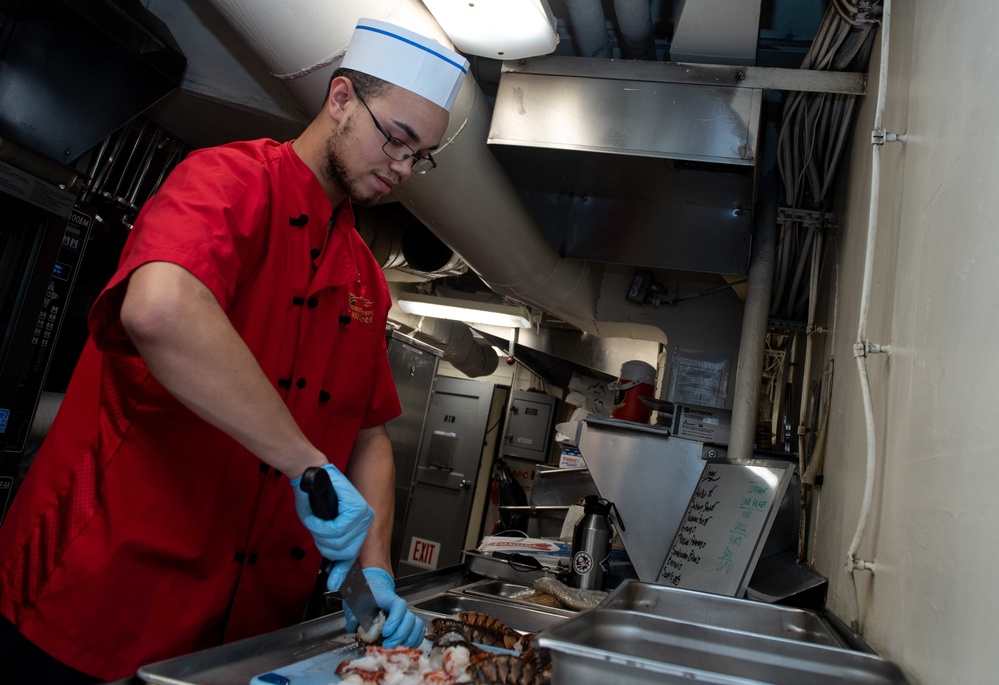 U.S. Sailor prepares a meal