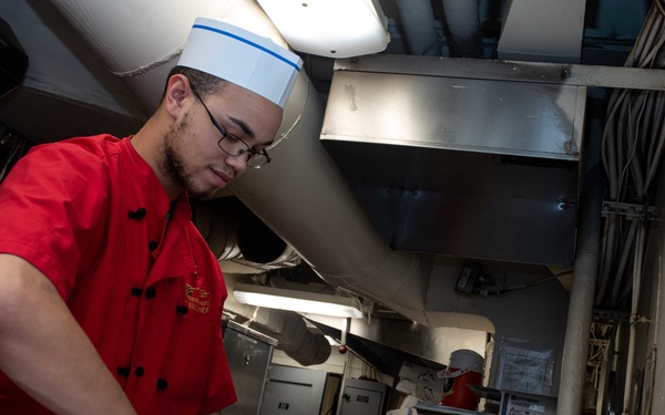 U.S. Sailor prepares a meal