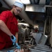 U.S. Sailor prepares a meal