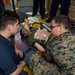 Sailors and Marines participate in a Medical Training Team (MTT) drill