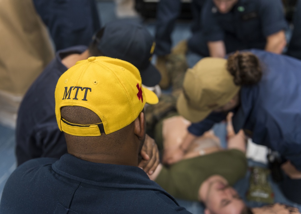 Sailors and Marines participate in a Medical Training Team (MTT) drill