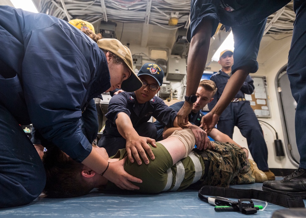 Sailors and Marines participate in a Medical Training Team (MTT) drill