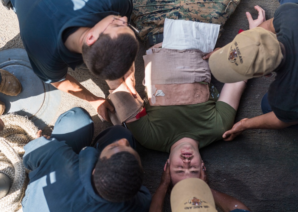 Sailors and Marines participate in a Medical Training Team (MTT) drill