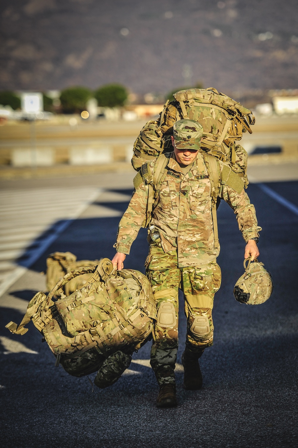 Paratrooper helps carry the load