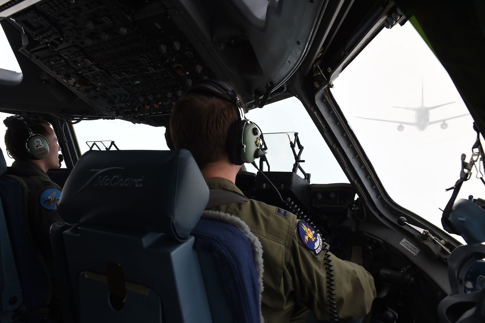 C-17 prepares to refuel from a KC-46