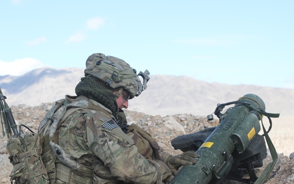 U.S. Soldier Fixes Javelin on a Hill