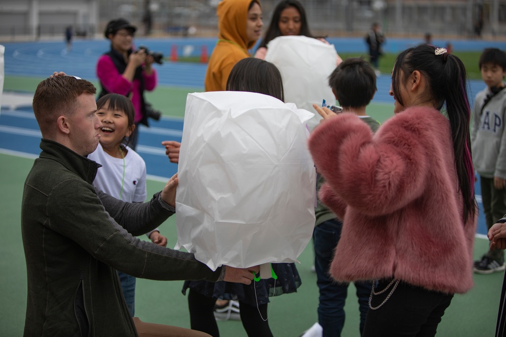 US service members volunteer in lantern festival