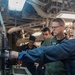 U.S. Navy Rear Adm. Michael Wettlaufer, commander of Carrier Strike Group (CSG) 3, visits with the crew of the guided-missile cruiser USS Mobile Bay