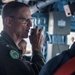 U.S. Navy Rear Adm. Michael Wettlaufer, commander of Carrier Strike Group (CSG) 3, visits with the crew of the guided-missile cruiser USS Mobile Bay