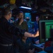 U.S. Navy Rear Adm. Michael Wettlaufer, commander of Carrier Strike Group (CSG) 3, visits with the crew of the guided-missile cruiser USS Mobile Bay