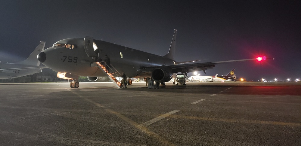 P-8A AIRCRAFT AT NIGHT