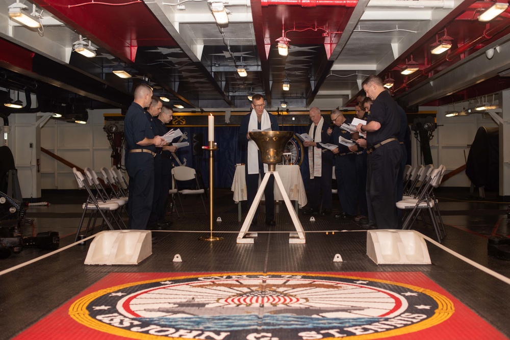 U.S. Sailors participate in baptism