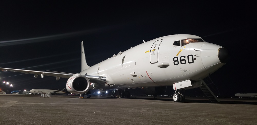 P-8A AIRCRAFT 860 AT NIGHT