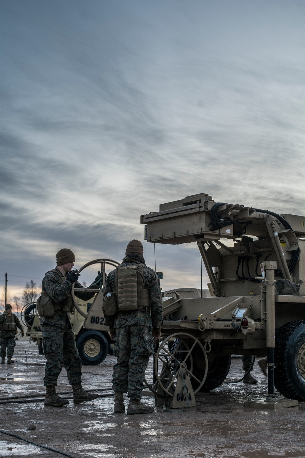 Marines from Headquarters Battery, 14th Marines set up an AN/TPQ-46 Fire-Finder