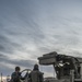 Marines from Headquarters Battery, 14th Marines set up an AN/TPQ-46 Fire-Finder